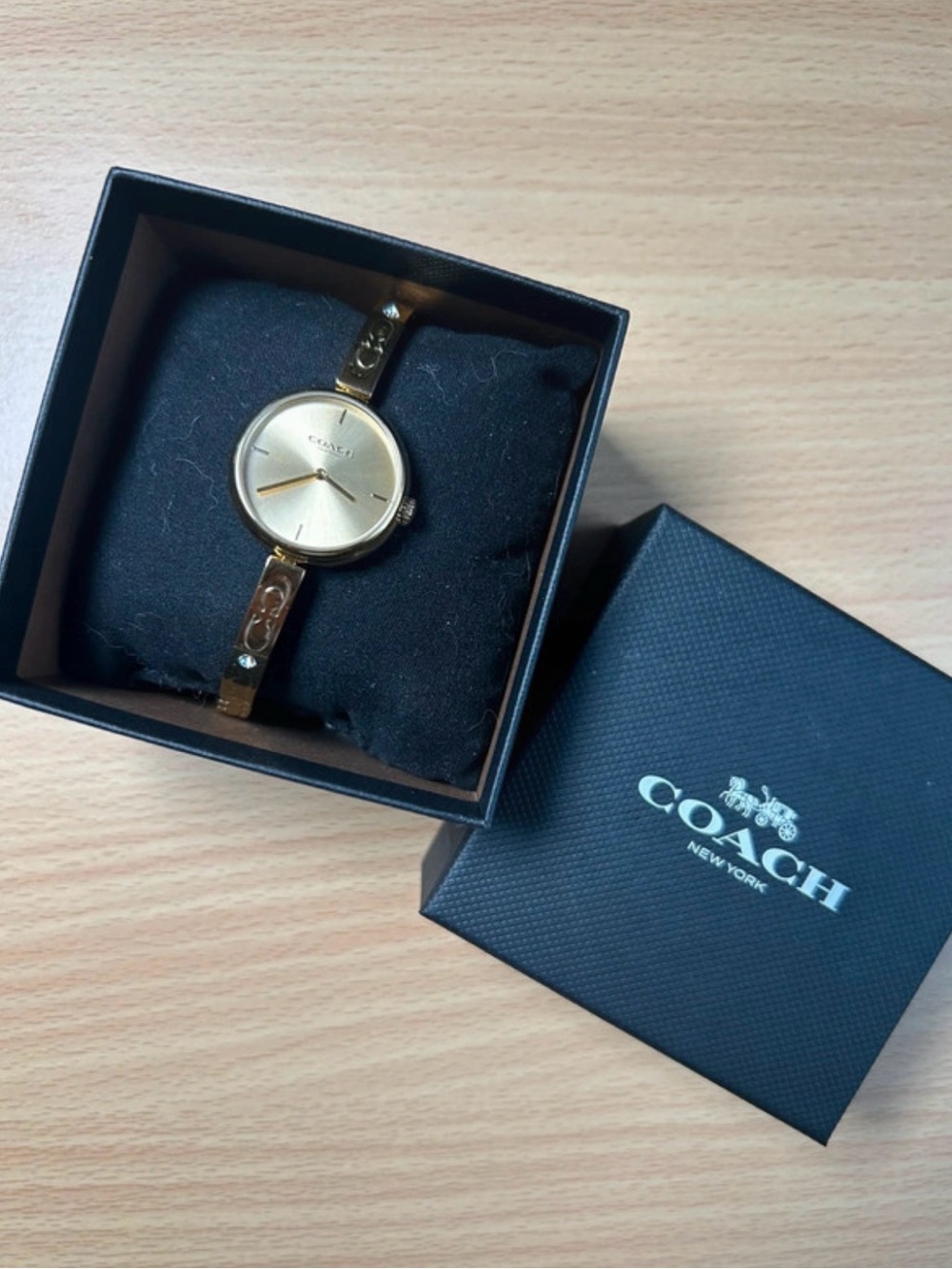 COACH Women’s Gold-Tone Slim Bracelet Watch